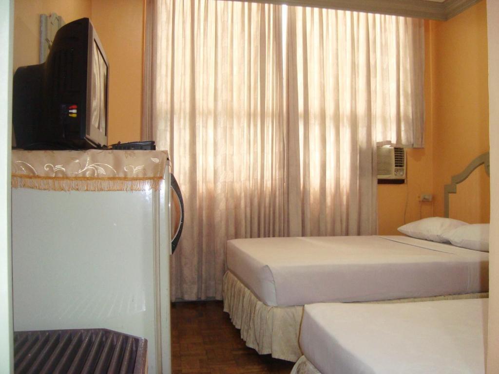 Cebu Northwinds Hotel Kamer foto